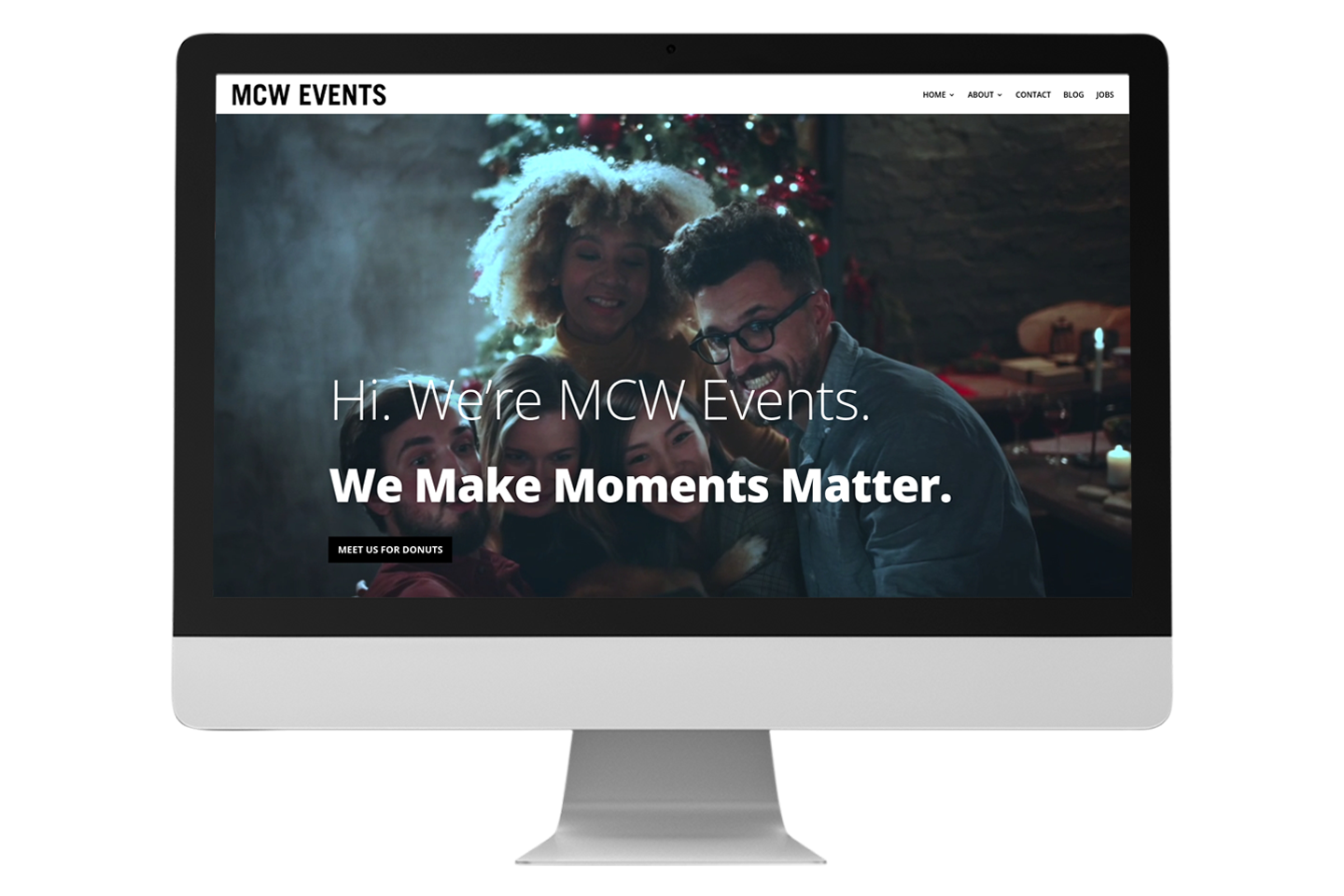 MCW Events website on an iMac with transparent background