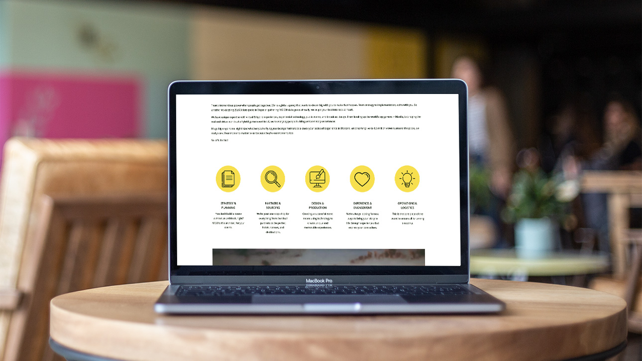 MCW Events Website on a Macbook Pro on a table