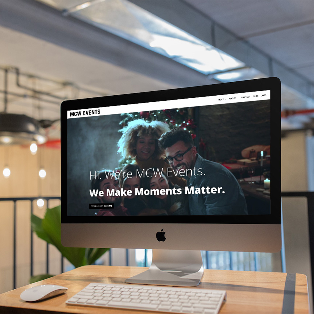 MCW Events Website on an iMac at a workstation